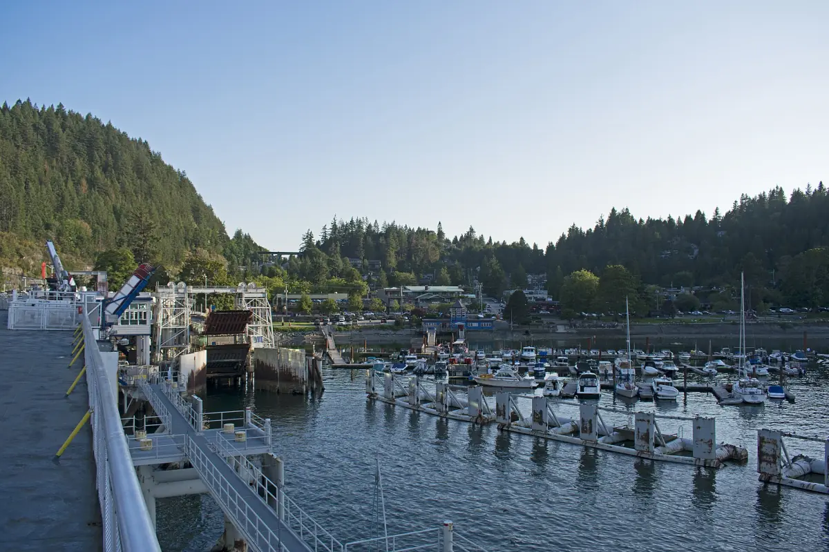 Horseshoe Bay marina and ferry terminal framed by forested hillsides