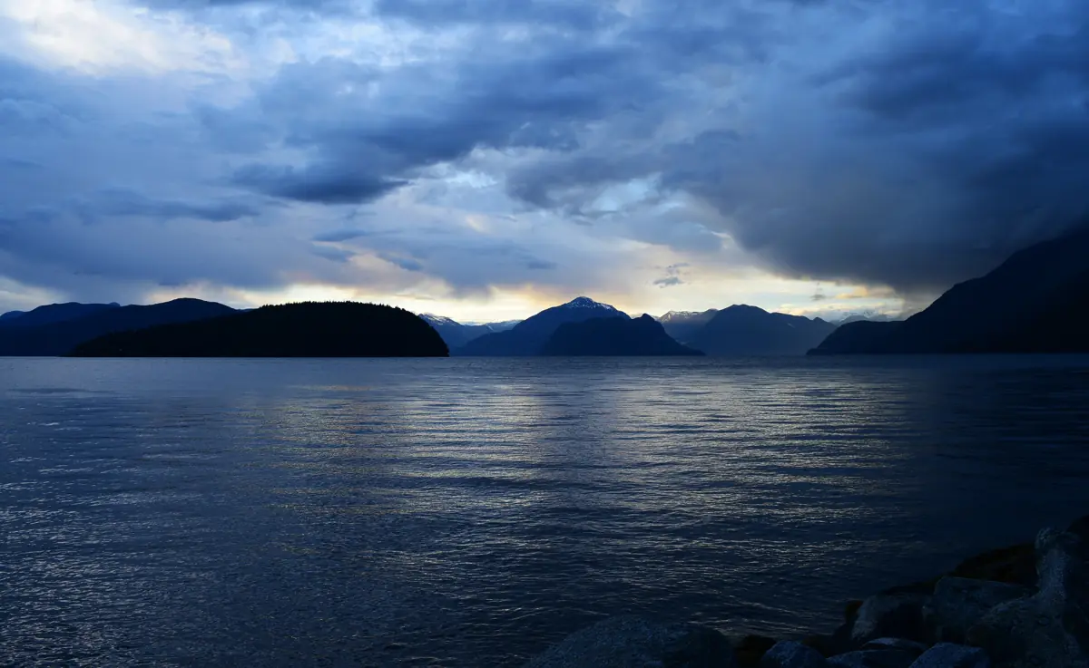 Dramatic clouds over the dark waters and mountains of Howe Sound